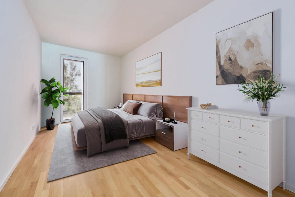 Modern eingerichtetes Schlafzimmer mit großem Bett, heller Holzoptik, minimalistischer Deko und bodentiefem Fenster.